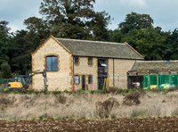 exterior building views of Beckham's triple barn conversion