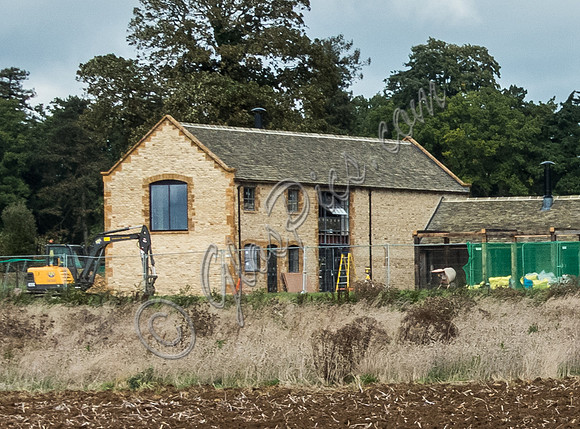 exterior building views of Beckham's triple barn conversion
