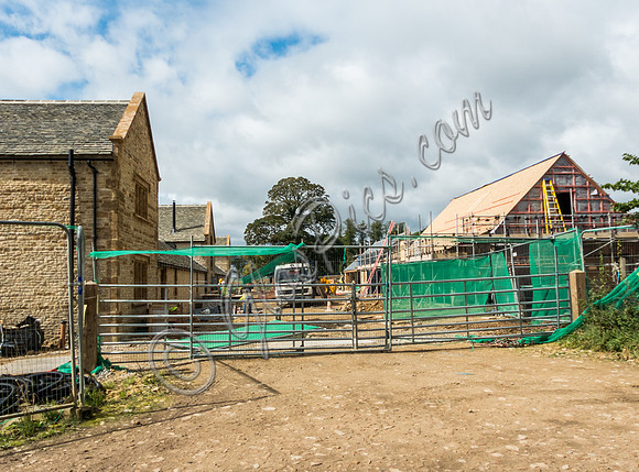 exterior building views of Beckham's triple barn conversion