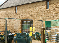 exterior building views of Beckham's triple barn conversion