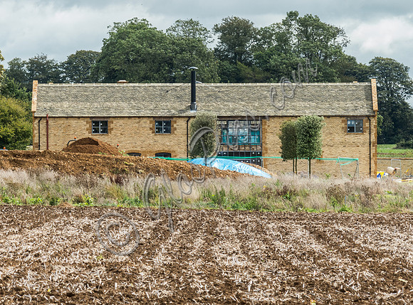 exterior building views of Beckham's triple barn conversion
