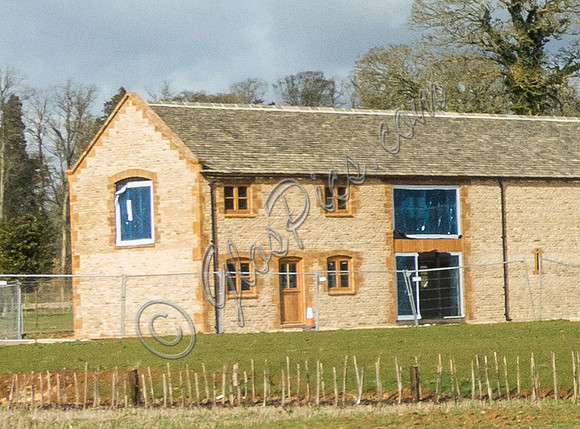 exterior building views of Beckham's triple barn conversion