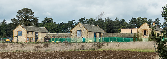 exterior building views of Beckham's triple barn conversion