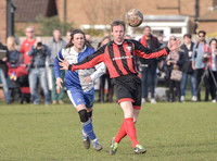 Stuart 'Psycho' Pearce for Longford AFC, arms outstretched  with ball near head v Wotton Rovers player, long hair with headband