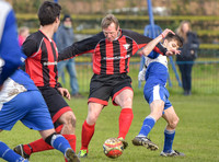 Stuart 'Psycho' Pearce for Longford AFC arms outstretched, foot on ball v Wotton Rovers player
