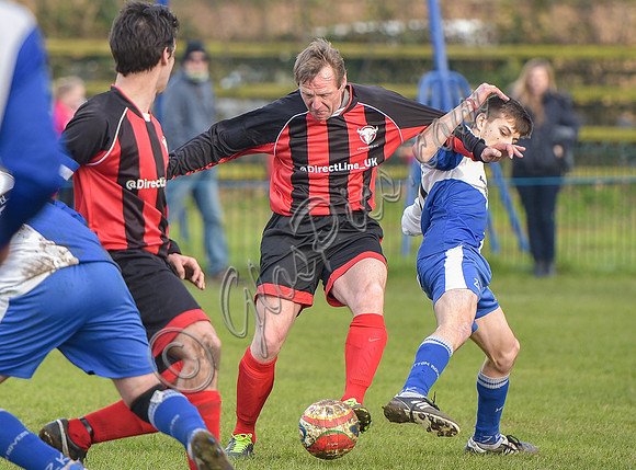 Stuart 'Psycho' Pearce for Longford AFC arms outstretched, foot on ball v Wotton Rovers player