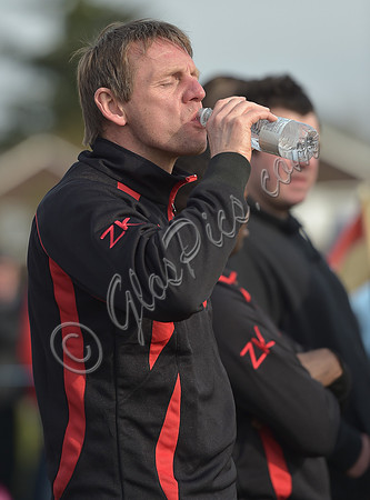 Stuart 'Psycho' Pearce for Longford AFC wearing team tracksuit drinking water from bottle,
