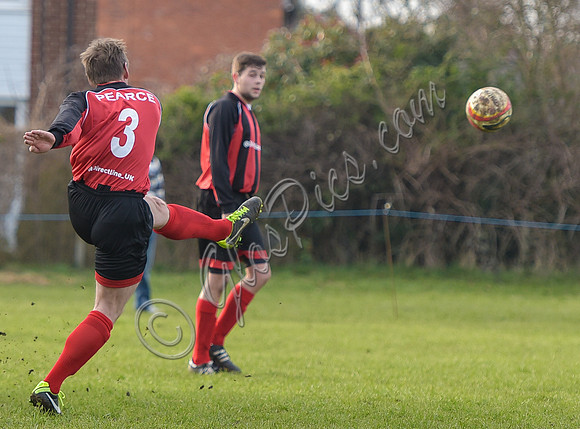 Stuart 'Psycho' Pearce for Longford AFC taking free kick, leg  outstretched, ball in air