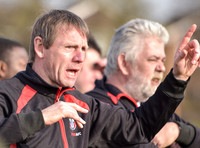Stuart 'Psycho' Pearce for Longford AFC wearing team tracksuit with Club manager Nick Dawe in background