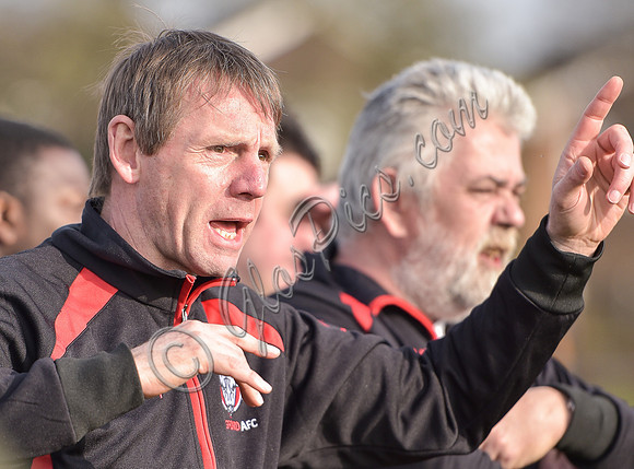 Stuart 'Psycho' Pearce for Longford AFC wearing team tracksuit with Club manager Nick Dawe in background