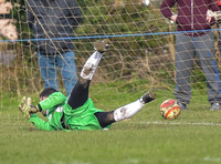 Penalty scored against Longford AFC goalie hitting floor in goal mouth, ball over the line