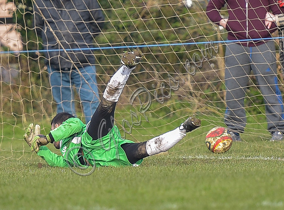 Penalty scored against Longford AFC goalie hitting floor in goal mouth, ball over the line