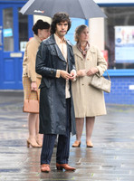 Ben Whishaw on set of "A Very English Scandal" with others