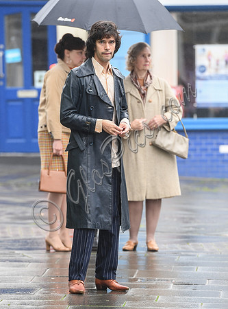 Ben Whishaw on set of "A Very English Scandal" with others
