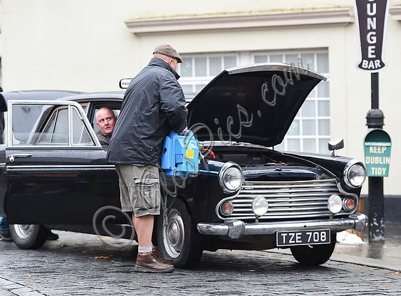 Black taxi with jump leads
