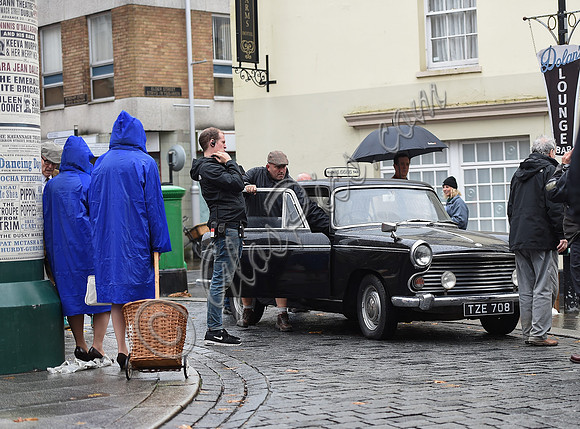 Film set with black taxi