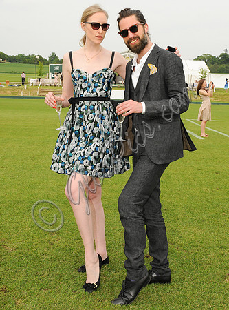 Jade Parfitt and Jack Guiness treading the divots