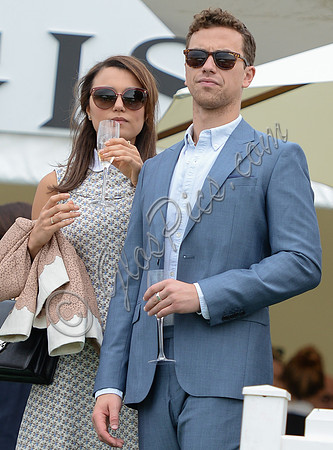 Samantha Barks and Richard Fleeshman wearing sunglasses and drinking champagnedrinking champagne