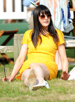 Lilah Parsons wearing bright yellow mini dress