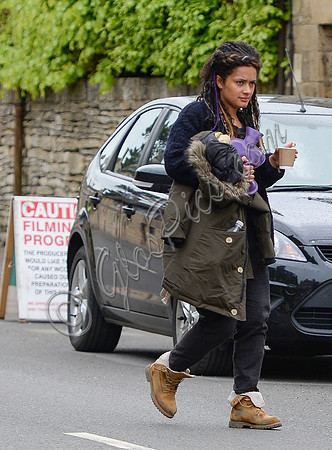 Karla Crome between sets carrying hot water bottle