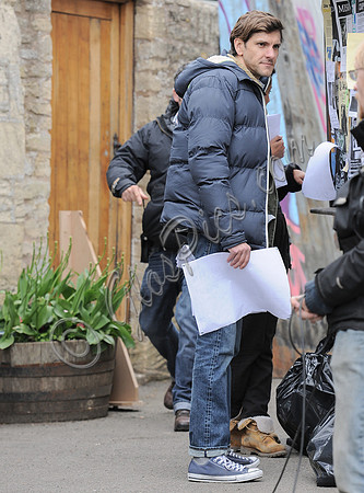 Mathew Baynton full length in a scene from Apocalypse Slough