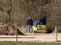 Builders and staff at work