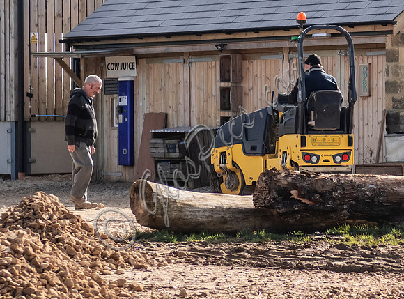 Builders and staff at work