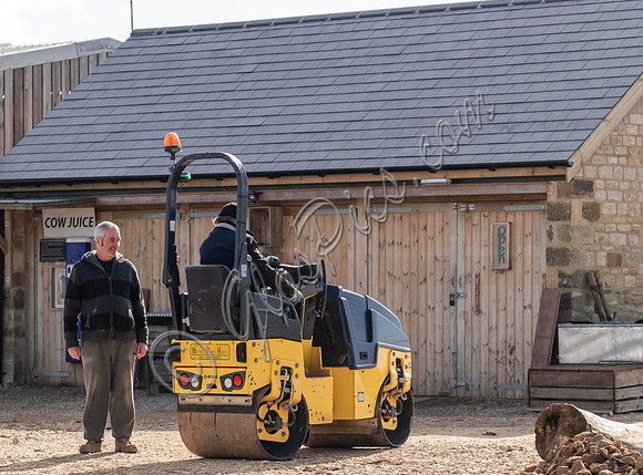 Builders and staff at work