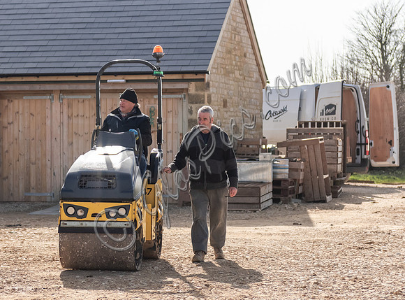 Builders and staff at work