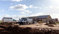 Builders and staff at work