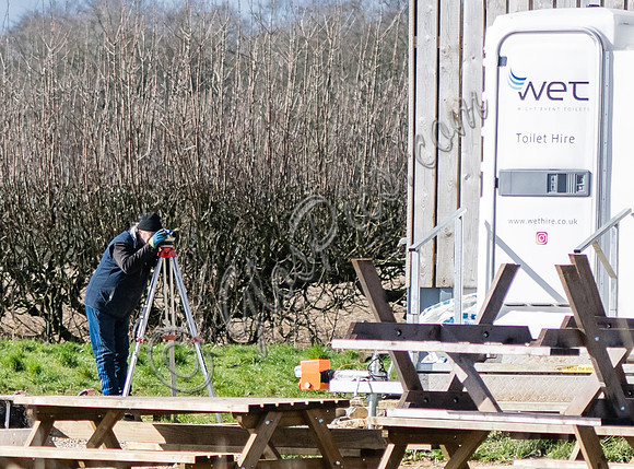 Builders and staff at work