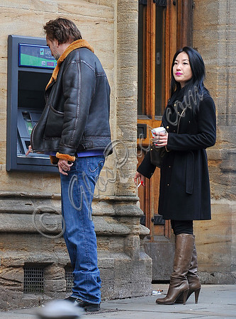 Nicolas Cage and Alice Kim at  cash machine