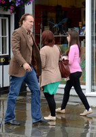 Nicolas Cage wandering around Glastonbury in the rain