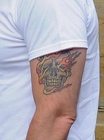 Nicolas Cage sporting "Ghost Rider" tattoo,  Close-up