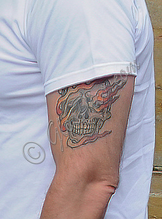 Nicolas Cage sporting "Ghost Rider" tattoo,  Close-up
