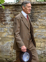 Douglas Reith in costume as Lord Merton on set photograph