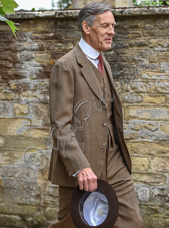 Douglas Reith in costume as Lord Merton on set photograph