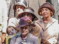 Downton Abbey cast seated for service of Dedication for War Memorial