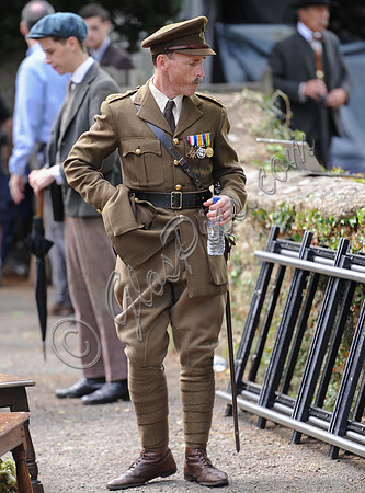 extras on set for filming
