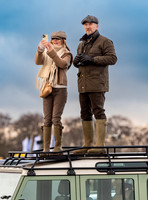 Geri Halliwell Horner and Christian Horner watch the racing from atop the Landrover