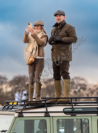 Geri Halliwell Horner and Christian Horner watch the racing from atop the Landrover
