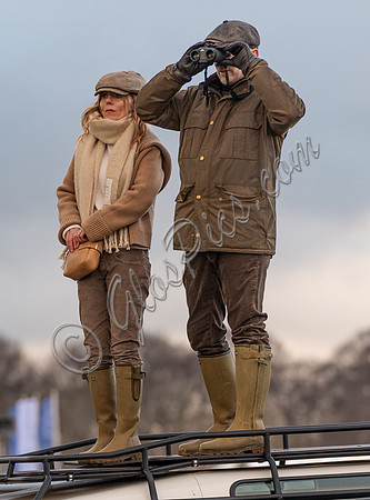 Geri Halliwell Horner and Christian Horner watch the racing from atop the Landrover