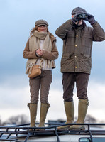 Geri Halliwell Horner and Christian Horner watch the racing from atop the Landrover