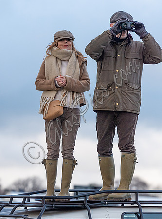 Geri Halliwell Horner and Christian Horner watch the racing from atop the Landrover