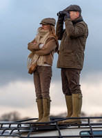 Geri Halliwell Horner and Christian Horner watch the racing from atop the Landrover