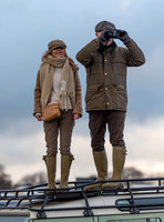 Geri Halliwell Horner and Christian Horner watch the racing from atop the Landrover