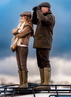 Geri Halliwell Horner and Christian Horner watch the racing from atop the Landrover