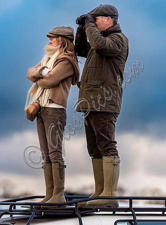 Geri Halliwell Horner and Christian Horner watch the racing from atop the Landrover