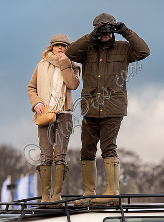 Geri Halliwell Horner and Christian Horner watch the racing from atop the Landrover
