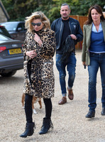 Kate Moss wearing Burberry Prorsum leopard print rabbit fur coat